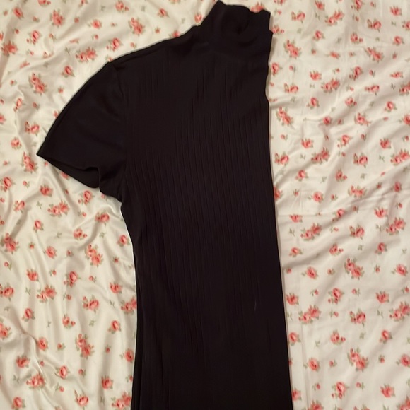 -Short sleeve turtle neck.                                -Eye Candy - Picture 2 of 2